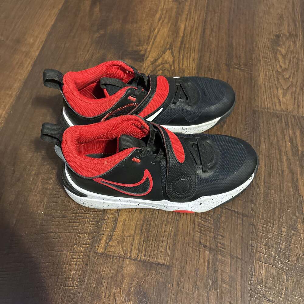 Nike Team Hustle 5Y Big Kids' Basketball Shoes in Black, University Red, and Whi